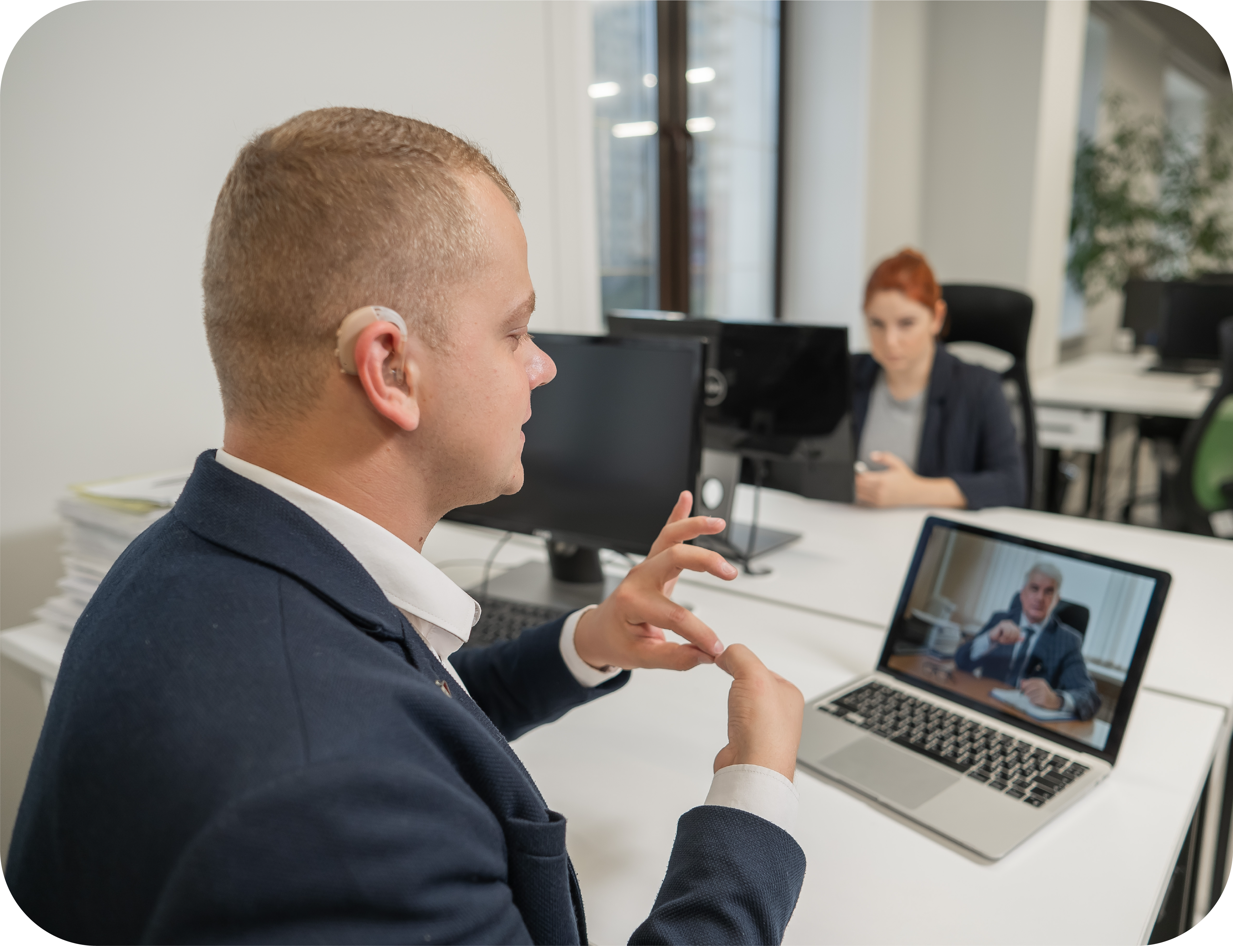 Male American Sign Language (ASL) Interpreter performing legal interpretation services