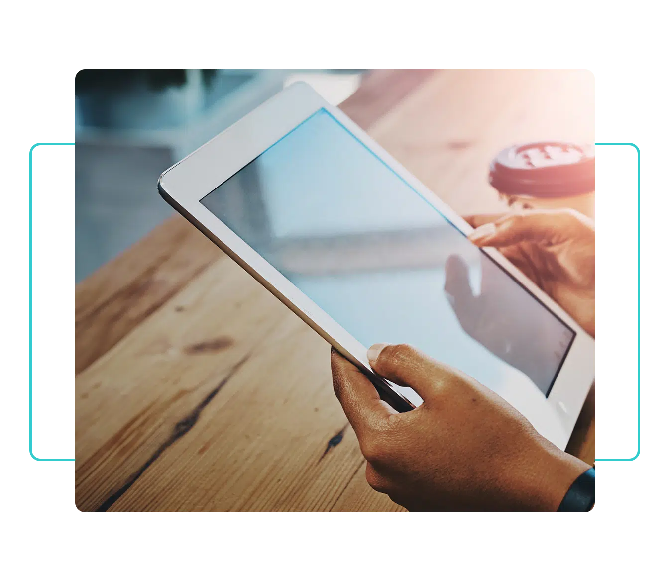 man holding and using tablet