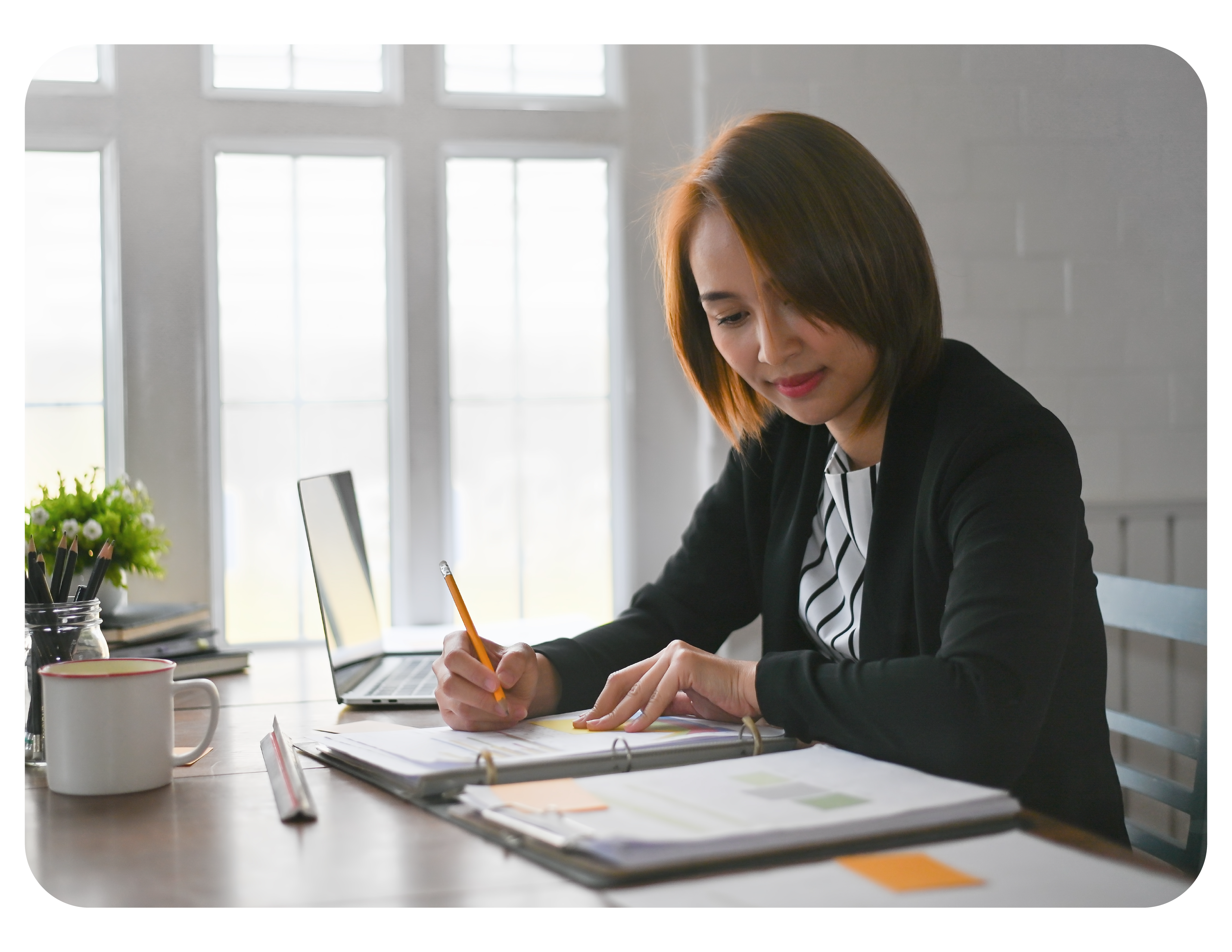 Image of a linguist translating documents